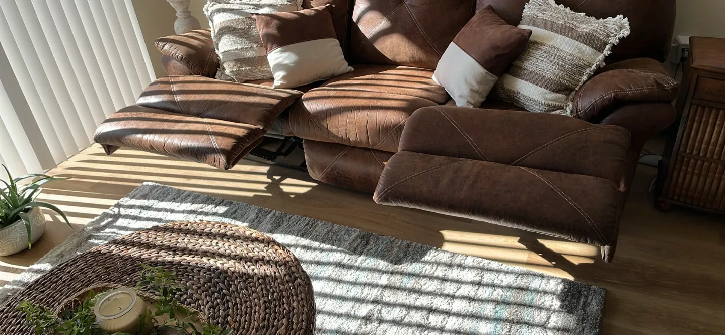 Brown Leather Reclining Sofa