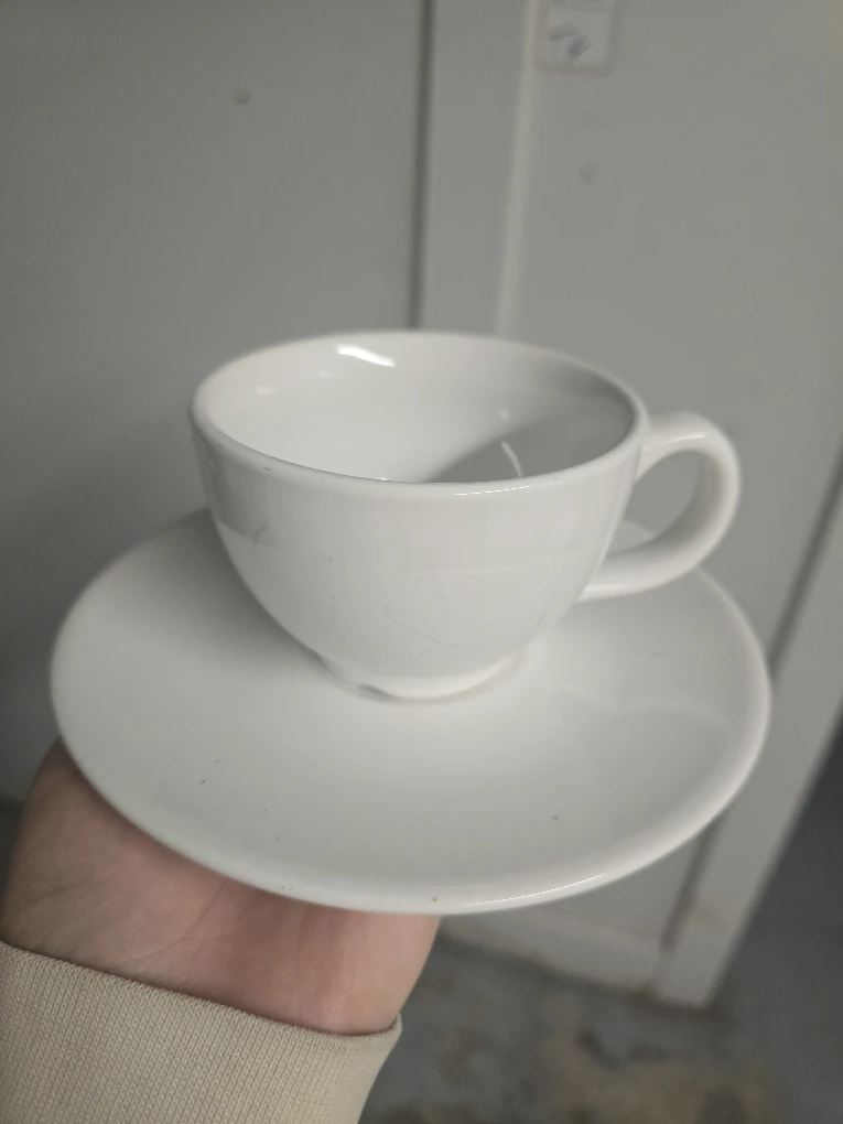 White Cup and Saucer Set