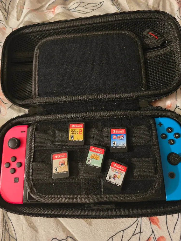 Nintendo Switch with 5 Games and Case image indicator(3)