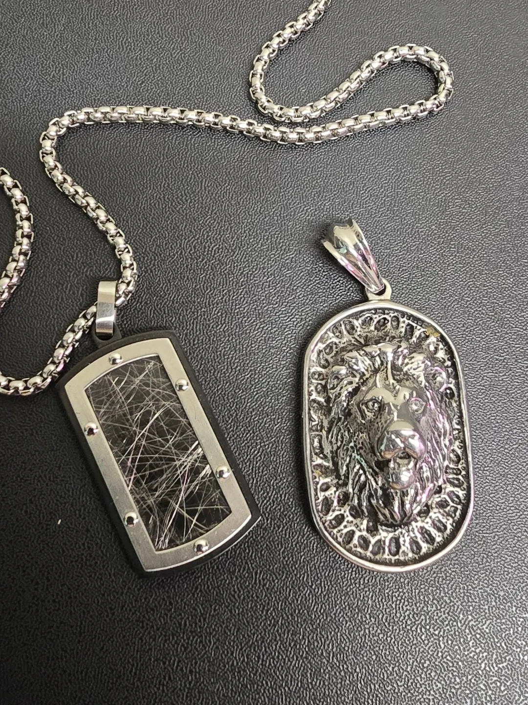 Two Silver tone Pendants with Chains image indicator(2)
