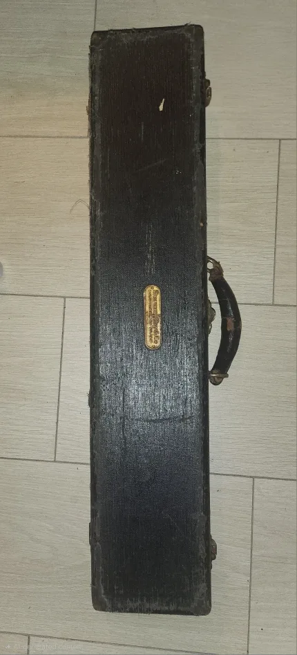Vintage metal clarinet in its case, along with a box image indicator(3)