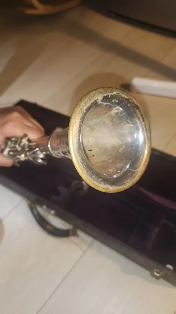 Vintage metal clarinet in its case, along with a box image indicator(4)