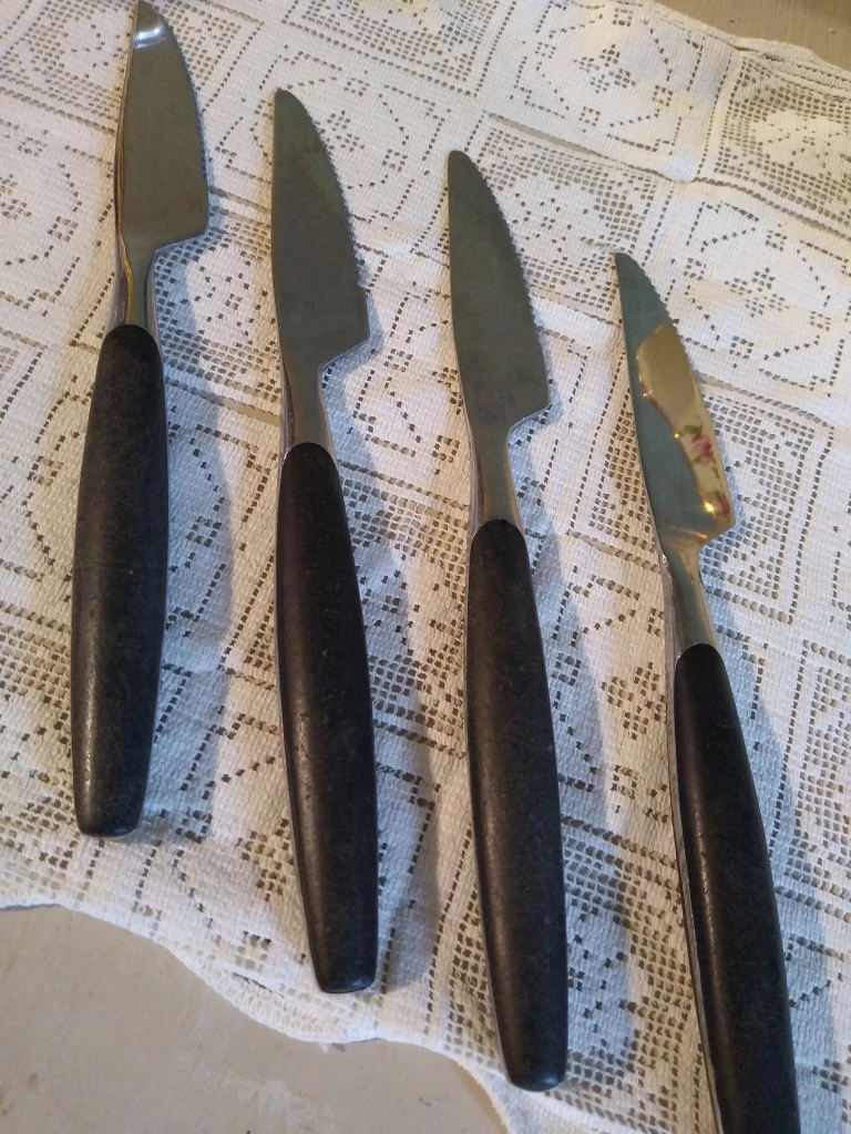 four vintage high quality imported steak knives