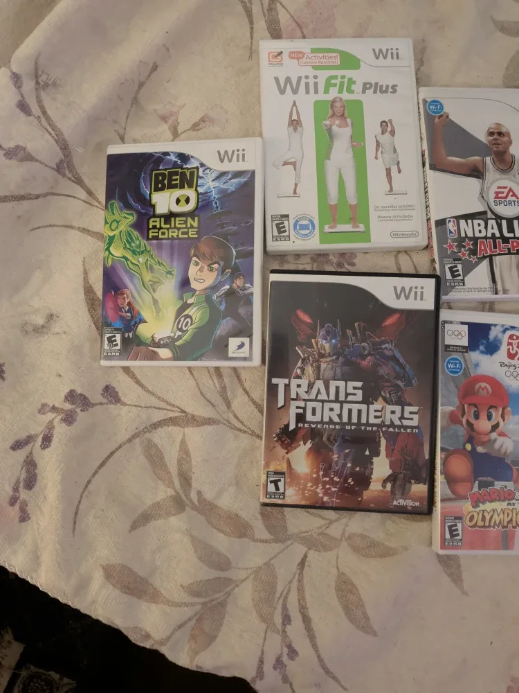 Wii Game Bundle - Wii Fit Plus, Ben 10, Transformers + image indicator(3)
