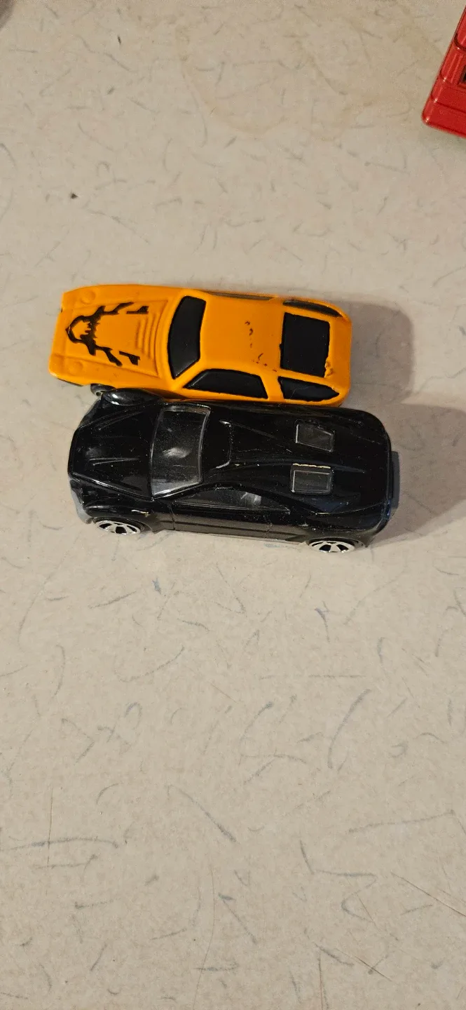 Two Toy Cars - Yellow and Black