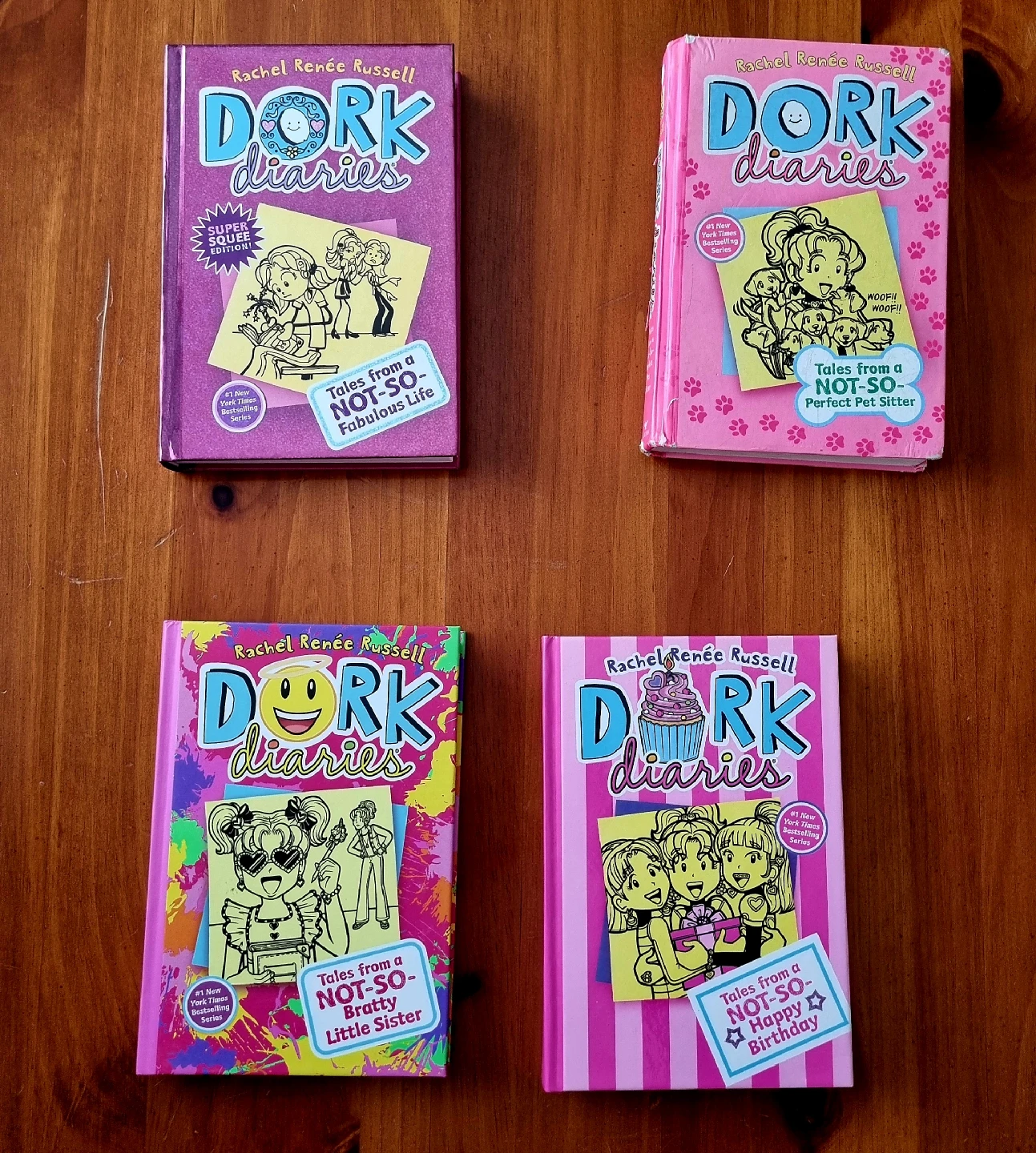 Set of 4 Dork Diaries Novels - #1 New York Times best-selling