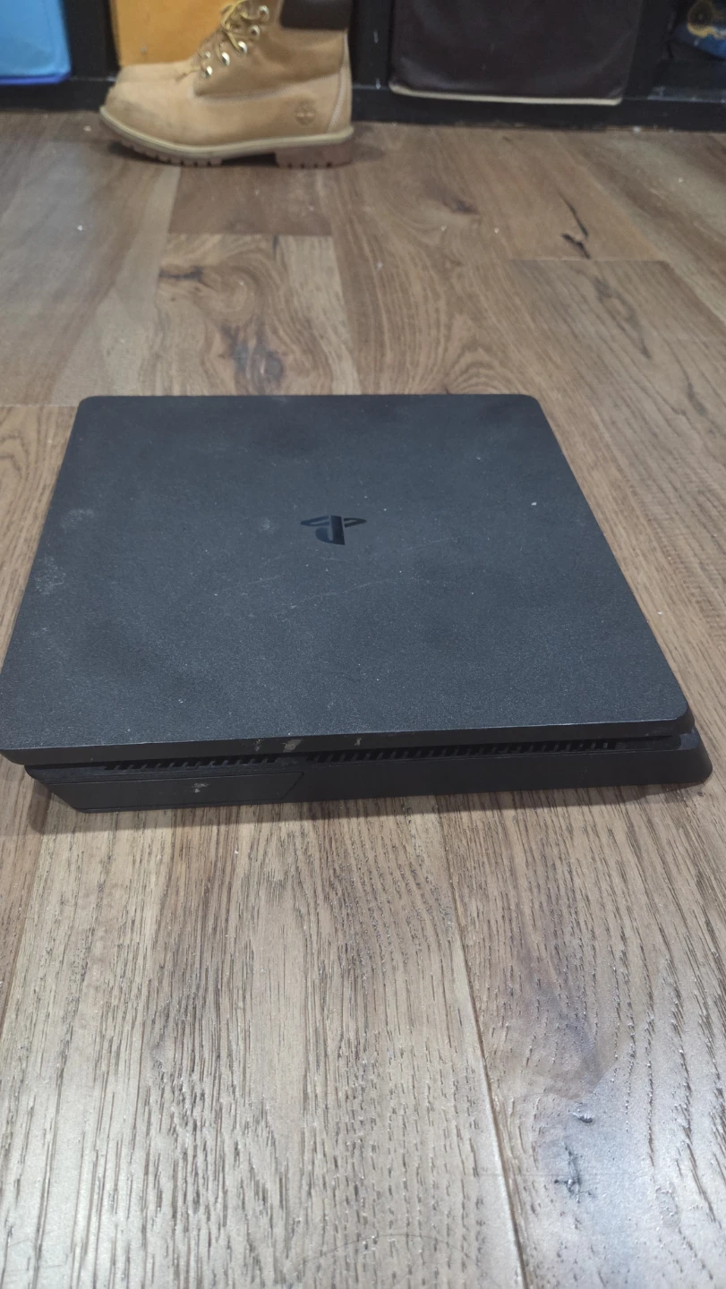 PlayStation 4 Slim with Games and Controllers - photo 3