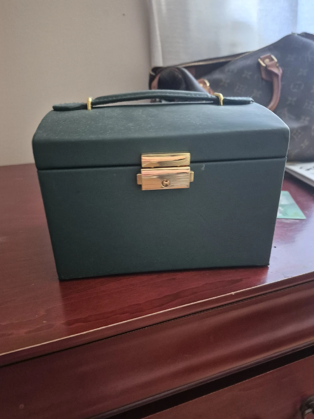 Green Jewelry Box with Assorted Jewelry
