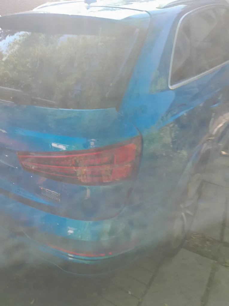 Damaged Blue Audi Q3 SUV - Parts or Repair