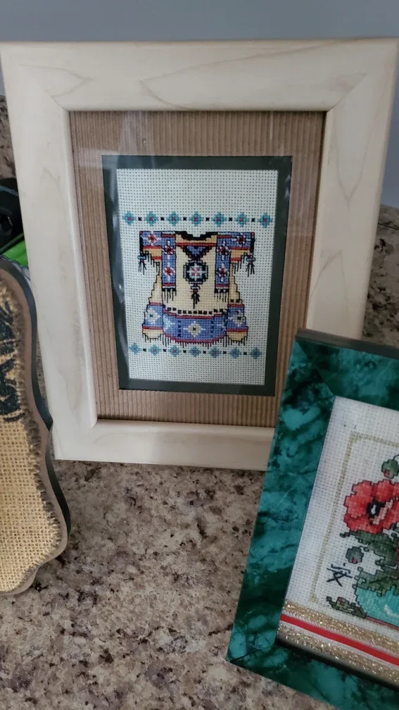 Framed Cross Stitch Art Native dress w/ shimmering thread