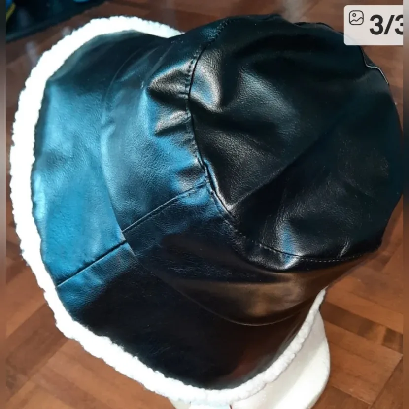 Black Faux Leather Bucket Hat with White Trim image indicator(3)