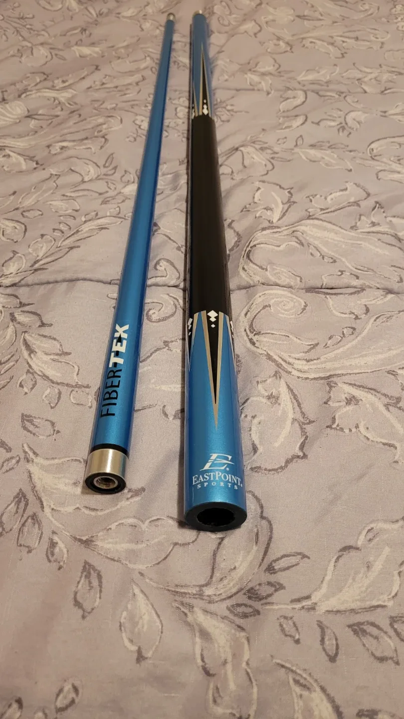 Variety of different pool cues image indicator(4)