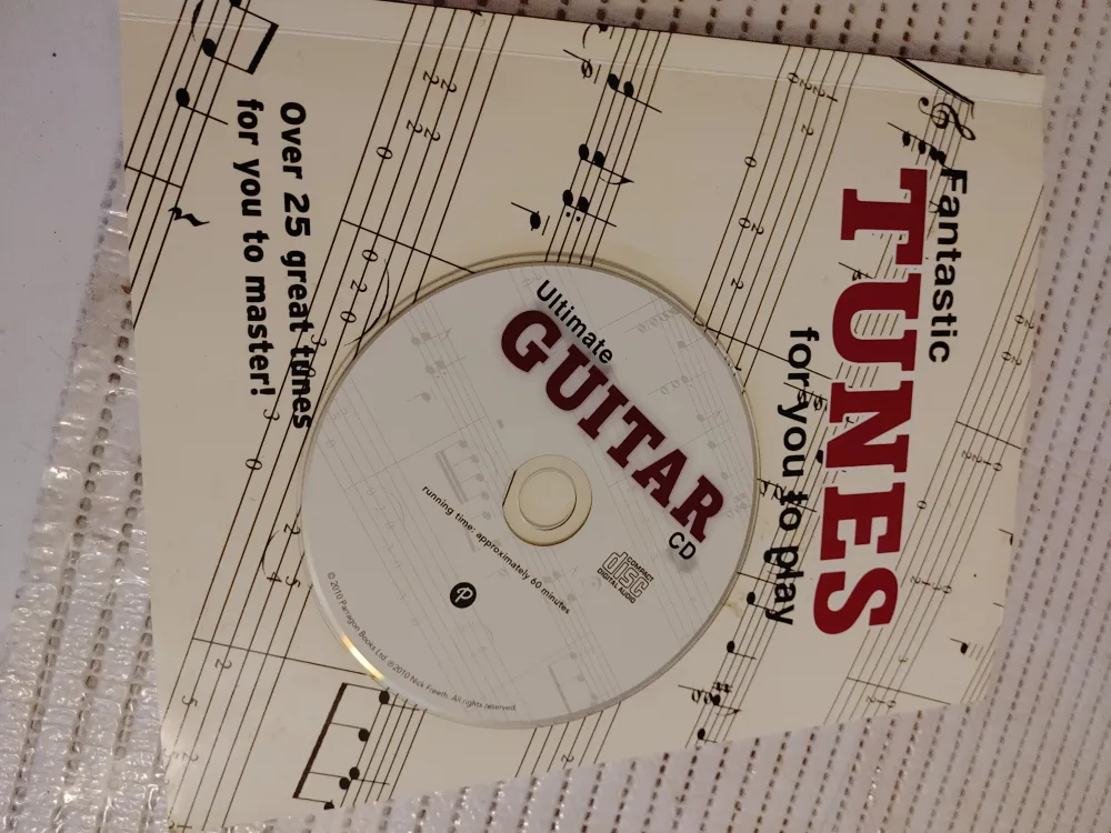 Ultimate Guitar CD & Learn to Play Book image indicator(2)