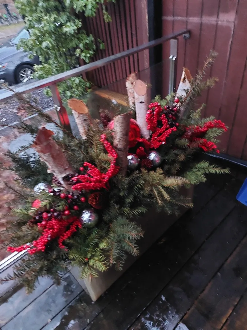 Festive Evergreen and other bows.  Winter Planter