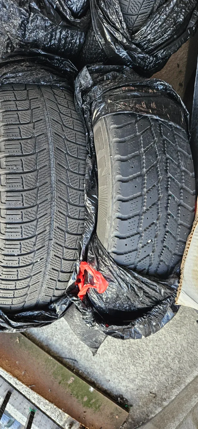 Used Set of 4 winter tires with rims. image indicator(5)