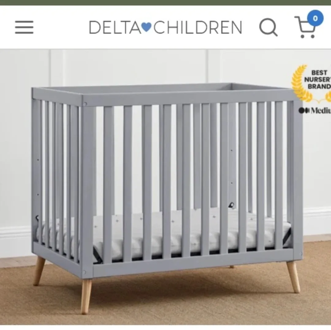 Delta Children Grey Mini Crib