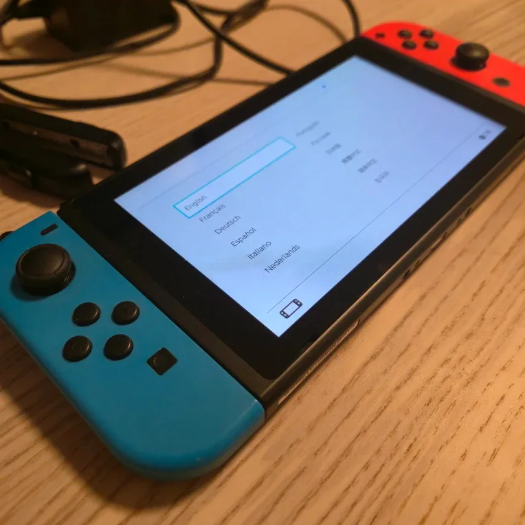 Nintendo Switch V2. Great condition, original accessories. image indicator(4)