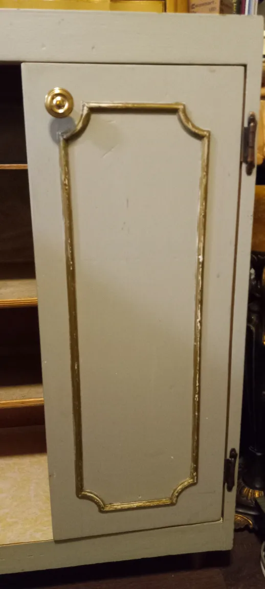 Cabinet with Gold Trim image indicator(4)