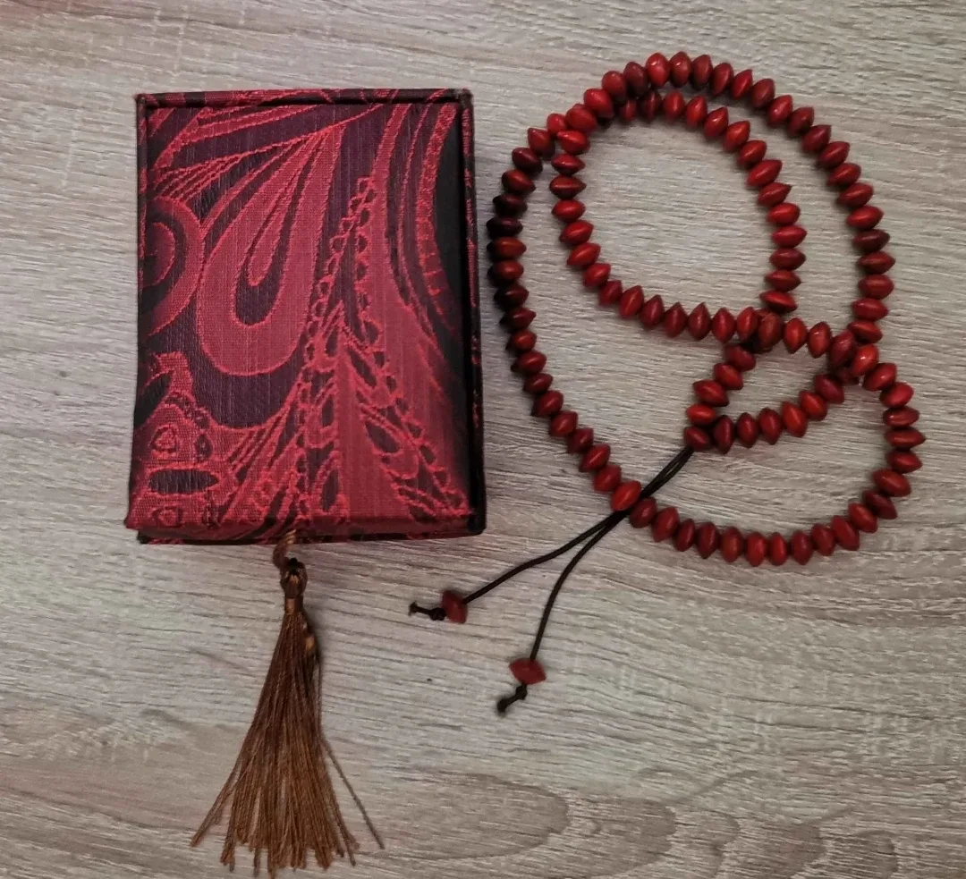 Red beaded mala with decorative box