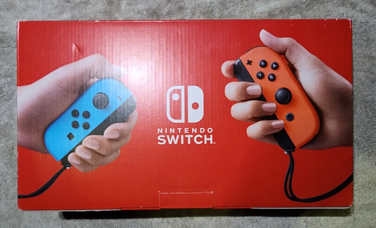 Nintendo Switch with Neon Blue and Neon Red Joy‑Con image indicator(2)