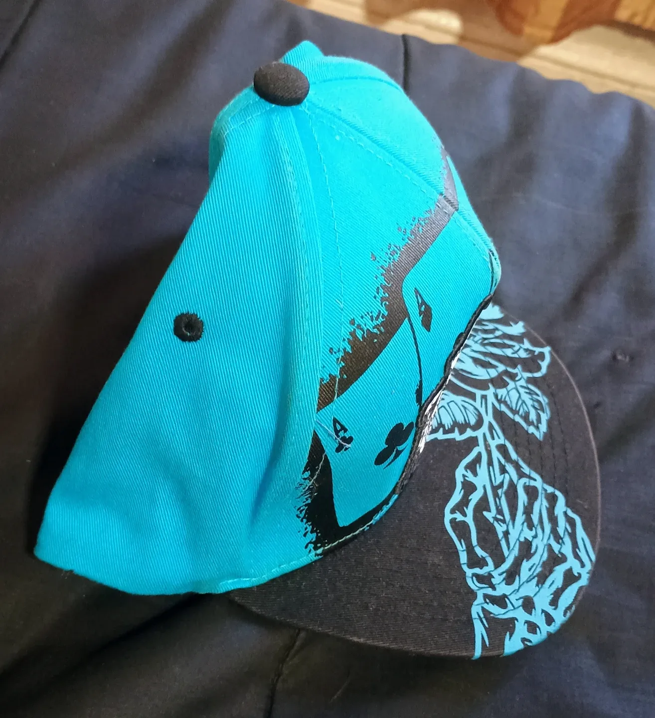 Turquoise & Black Graphic Baseball Cap image indicator(2)
