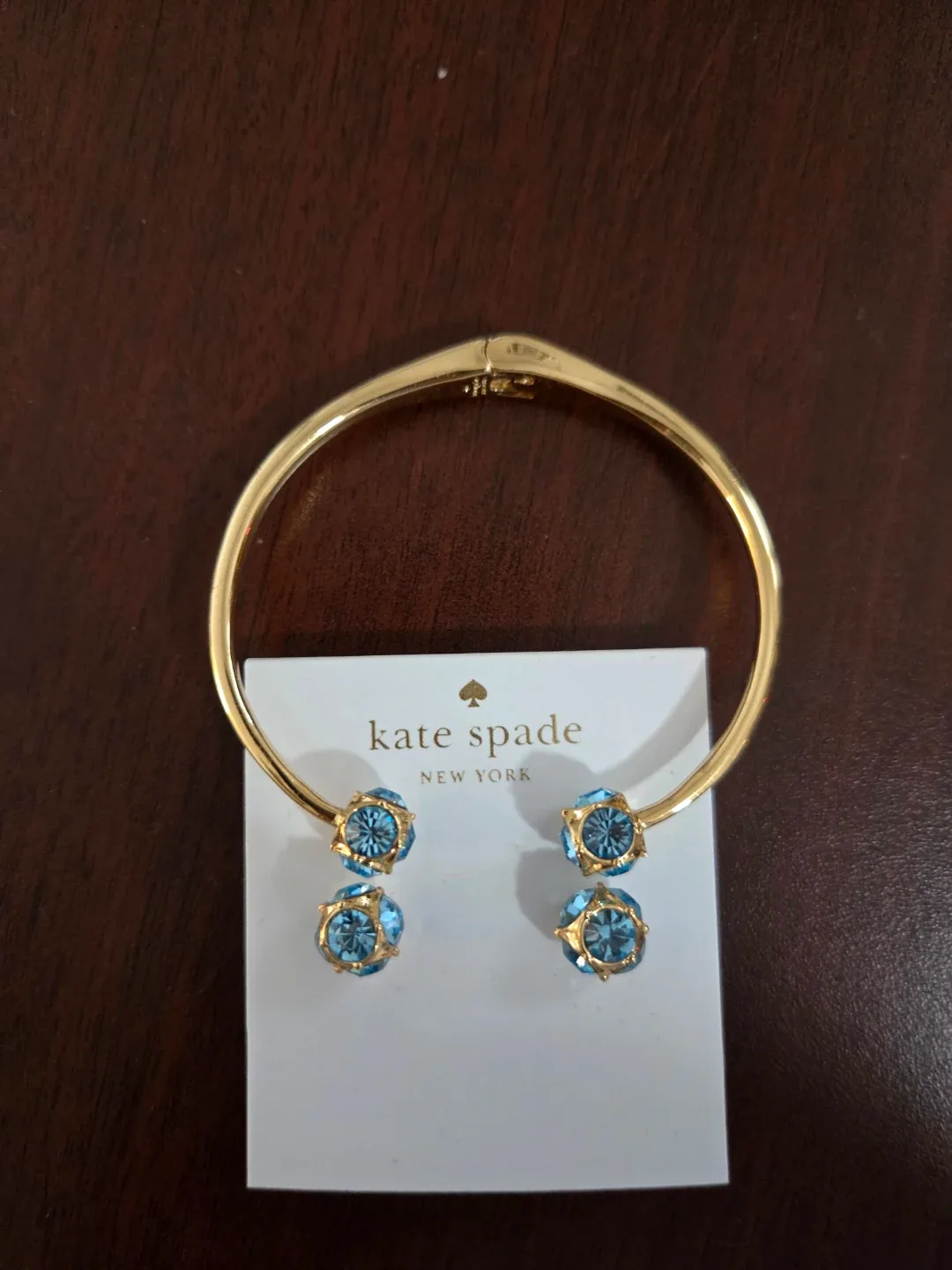 Kate Spade Gold-Tone Bangle Bracelet with Blue Crystals