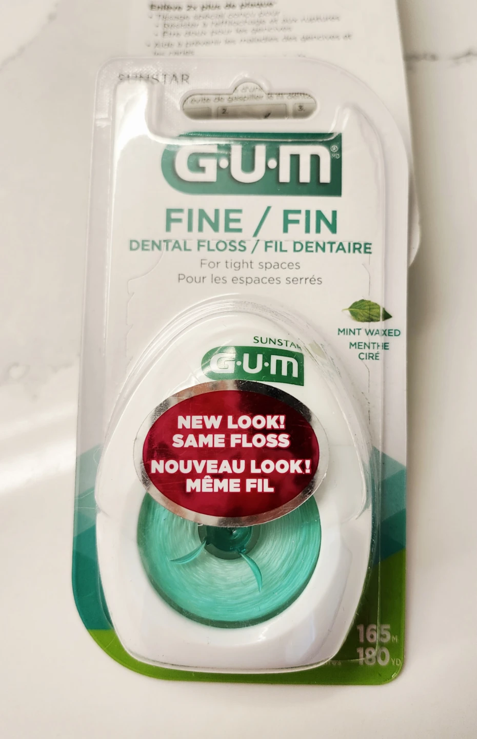 New G.U.M. Fine dental floss, 165m. Great for tight teeth.