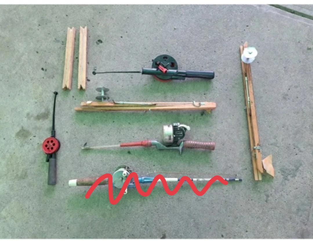 Assortment of Vintage Fishing Rods and Reels