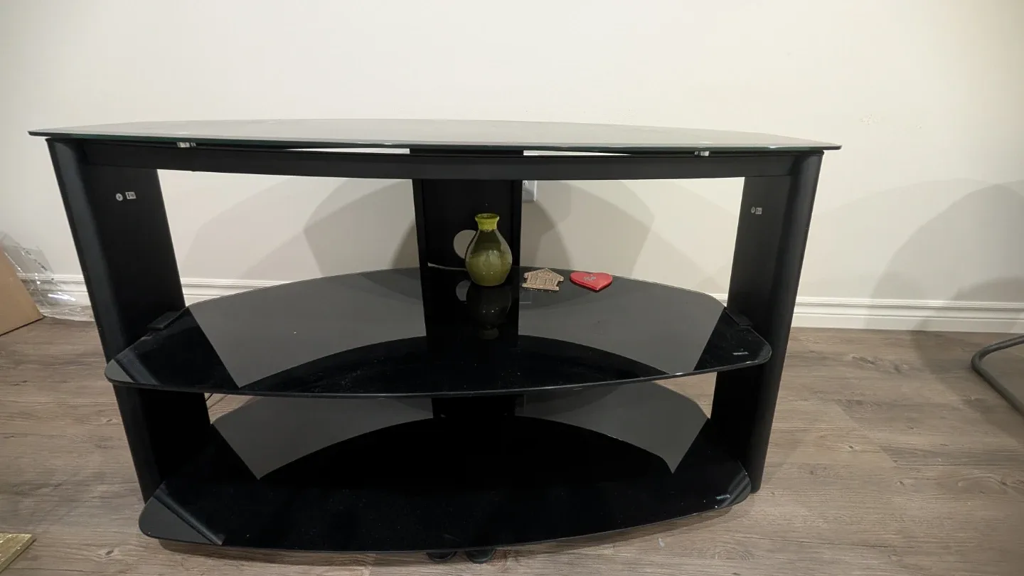 Selling a black glass corner TV stand