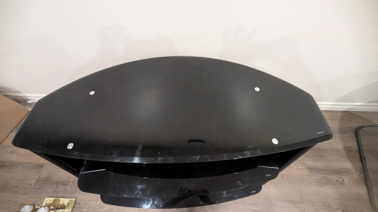 Selling a black glass corner TV stand image indicator(3)