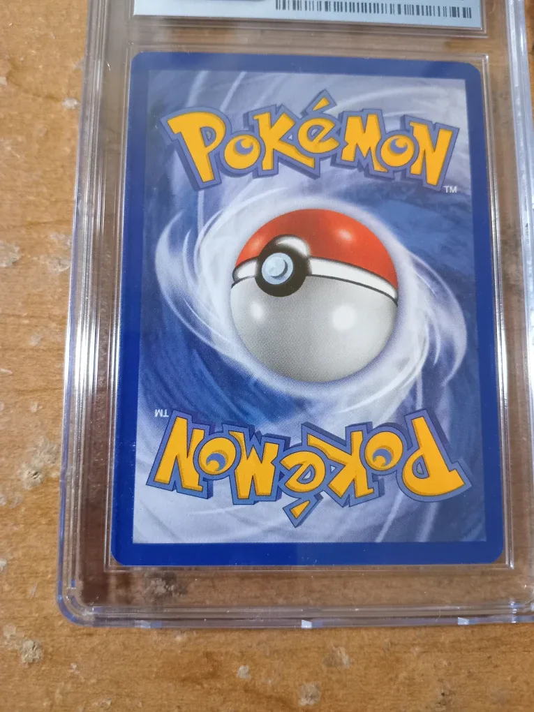 CGC 5.5 STARMINE POKÉMON 1999 BASE SET - SHADOWLESS 64/102 image indicator(5)