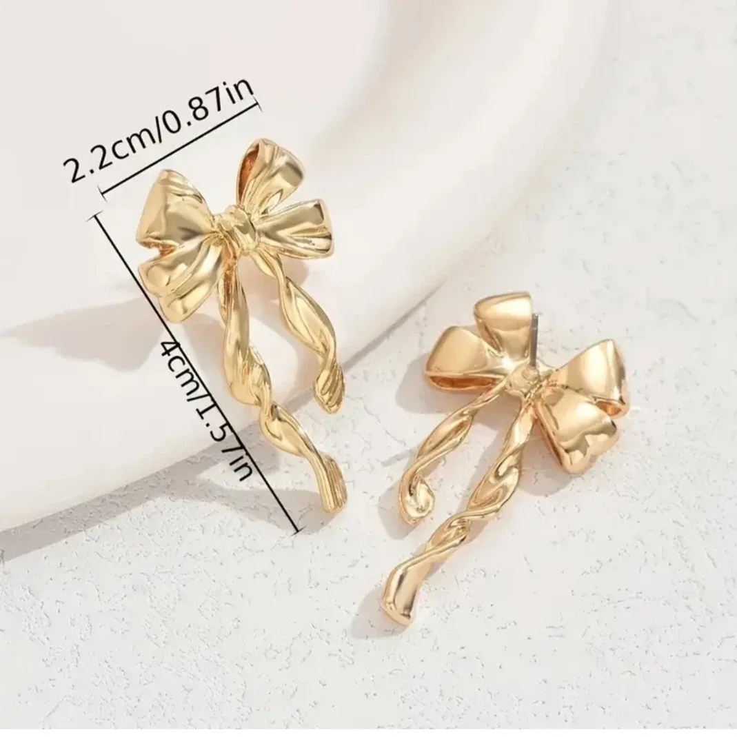 Gold Ribbon Drop Earrings image indicator(2)