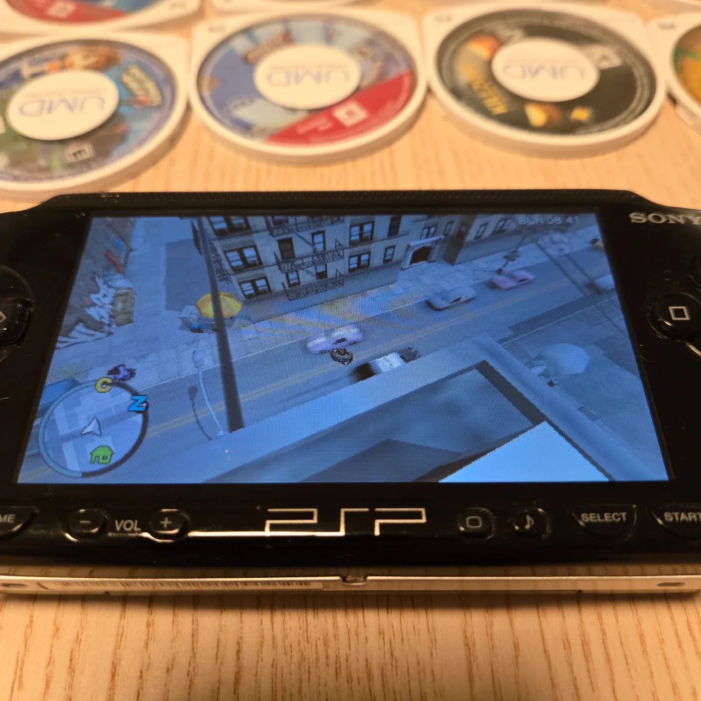 PSP 1001 lot. Original charger, battery, mem stick, case, games image indicator(4)