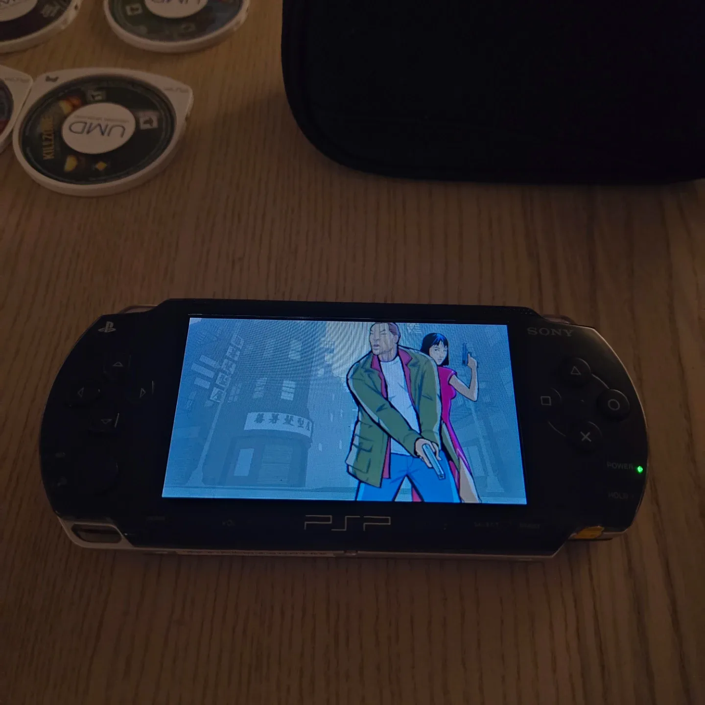 PSP 1001 lot. Original charger, battery, mem stick, case, games image indicator(7)