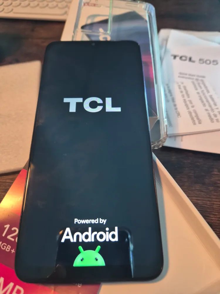 Open box, yet never used. TCL 505 Ocean Blue Smartphone image indicator(5)