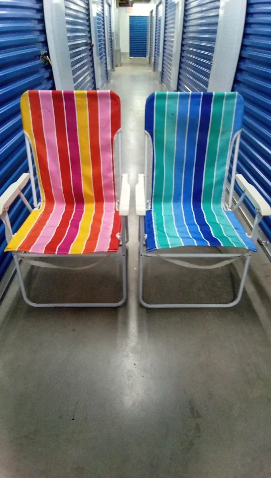 Two Striped Folding Beach Chairs
