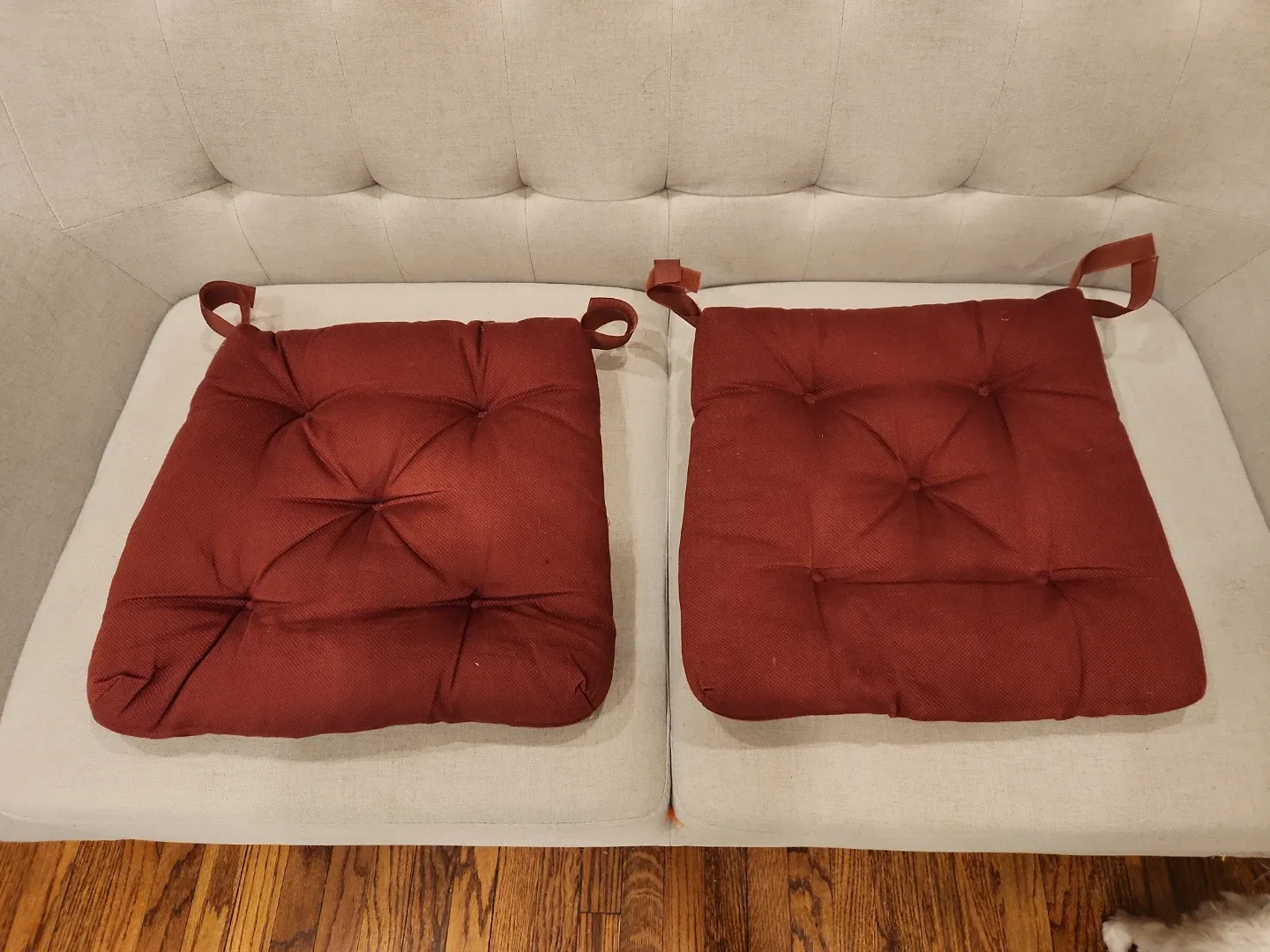 Two Red Tufted Chair Pads