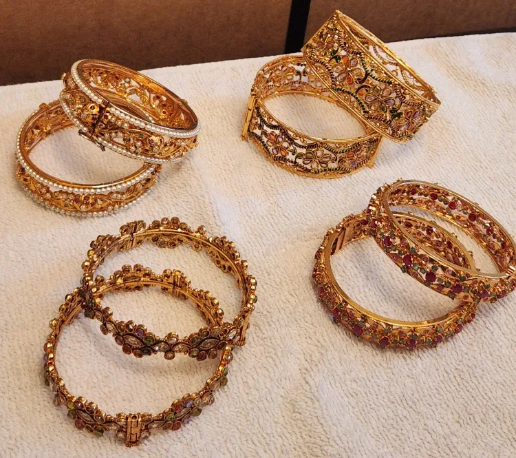 Gold Tone Bangles with Intricate Designs