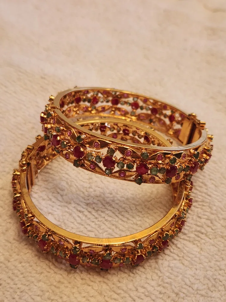 Gold Tone Bangles with Intricate Designs image indicator(2)
