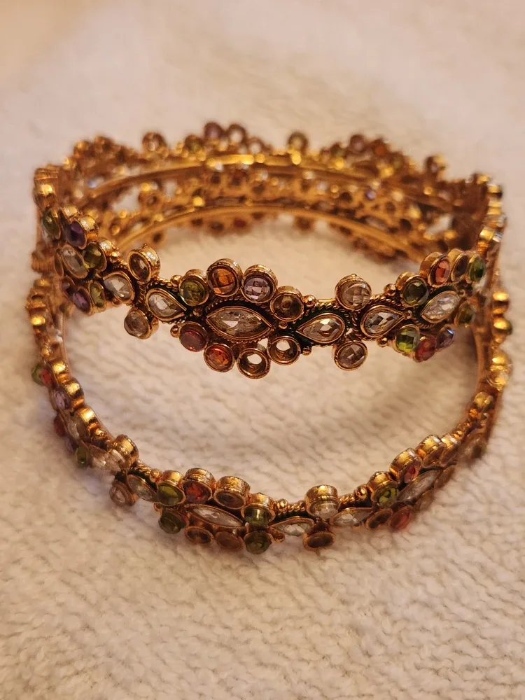 Gold Tone Bangles with Intricate Designs image indicator(4)