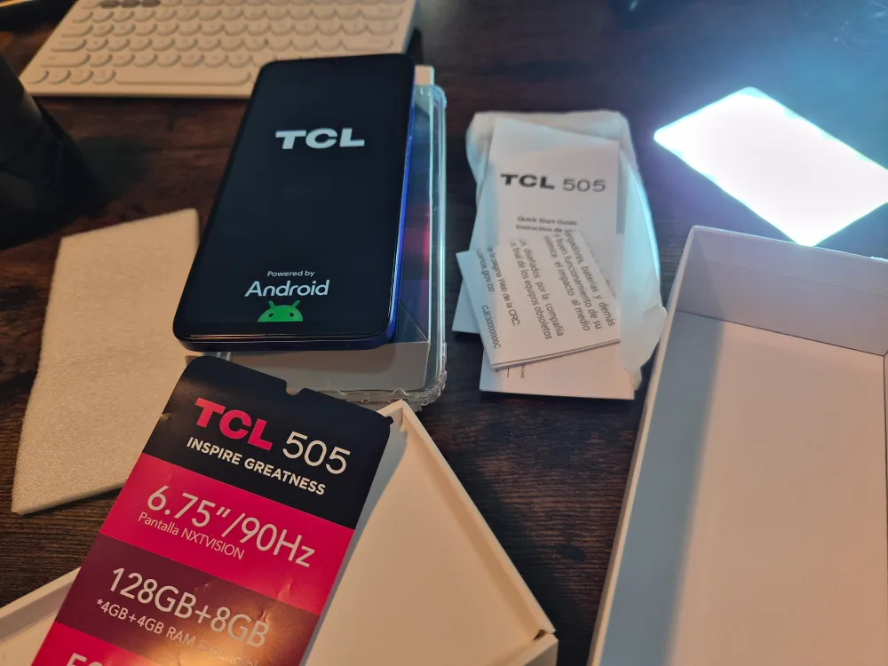 Open box, yet never used. TCL 505 Ocean Blue Smartphone image indicator(6)