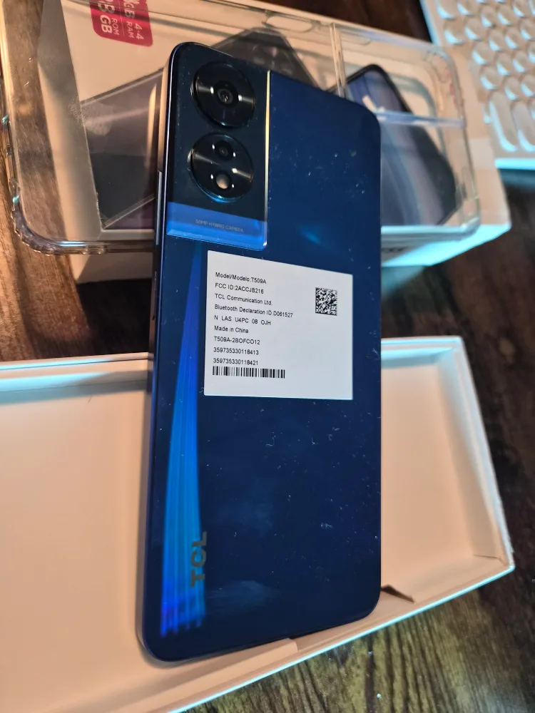Open box, yet never used. TCL 505 Ocean Blue Smartphone image indicator(7)