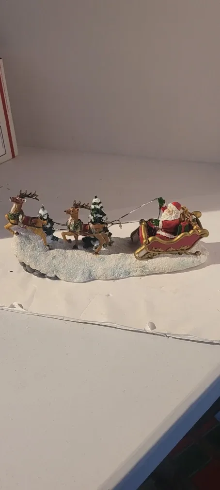 Santa Claus Sleigh and Reindeer Figurine