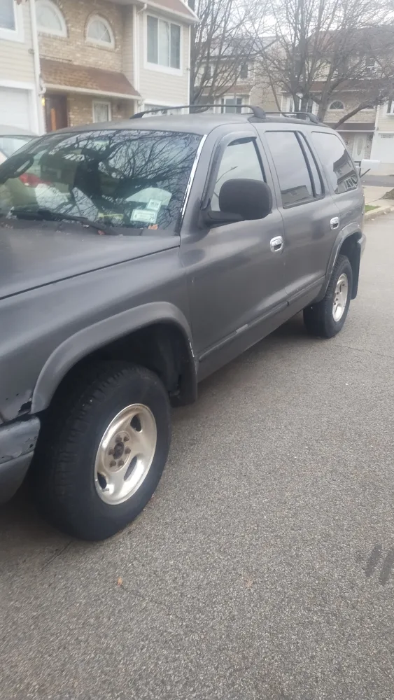 dodge durango 99 sold as is. needs work image indicator(7)