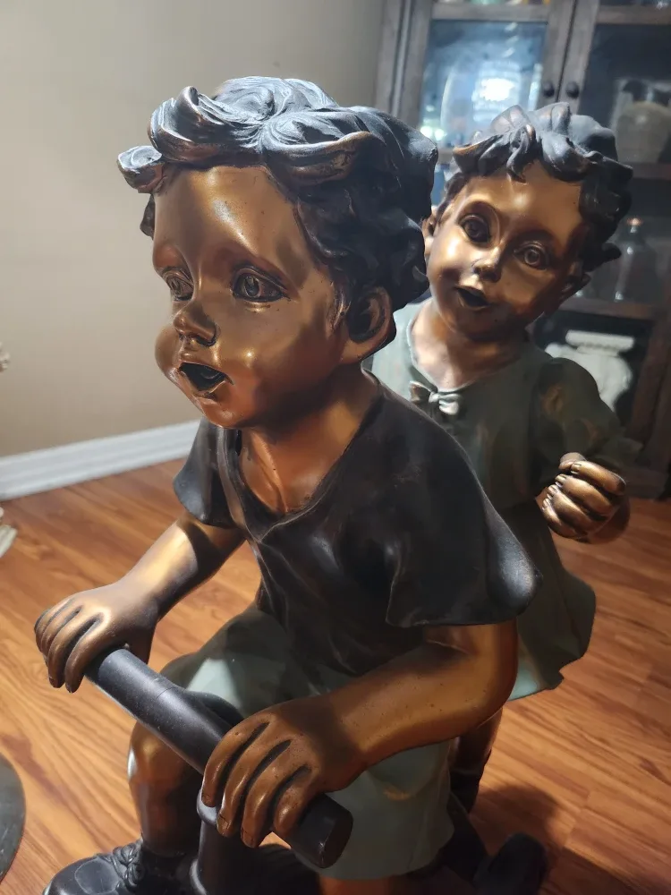 Bronze Finish Boy & Girl on Tricycle Statue image indicator(3)