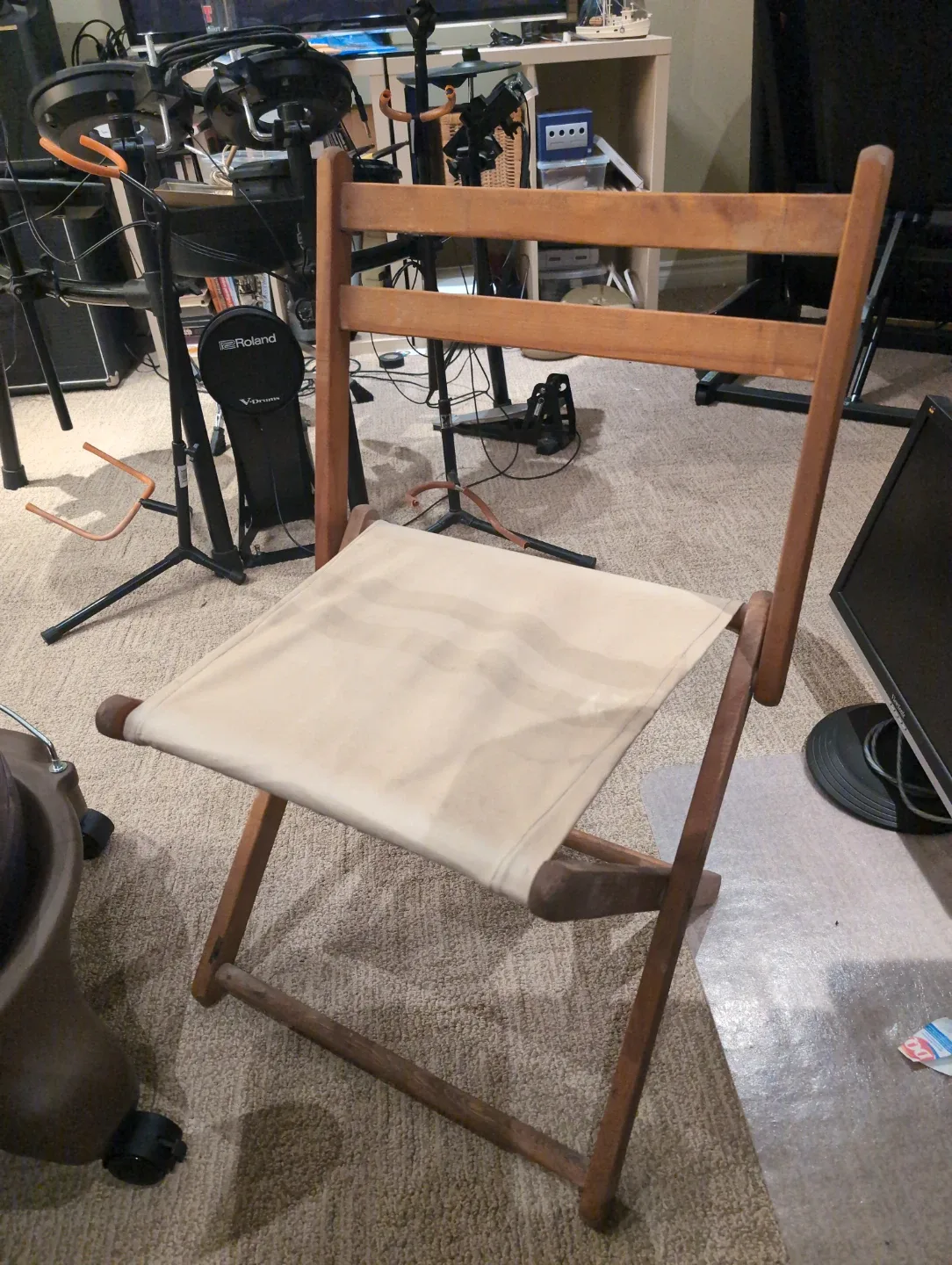 Folding wooden chair with canvas seat