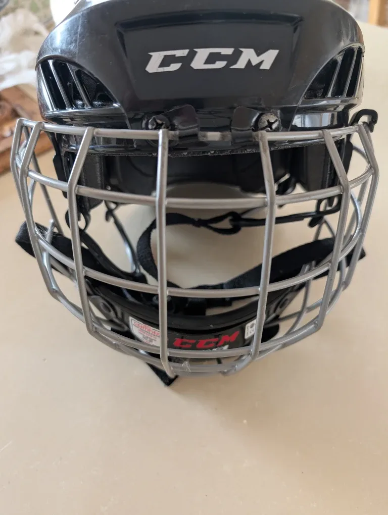 CCM Hockey Helmet with Cage - Size SM-25
