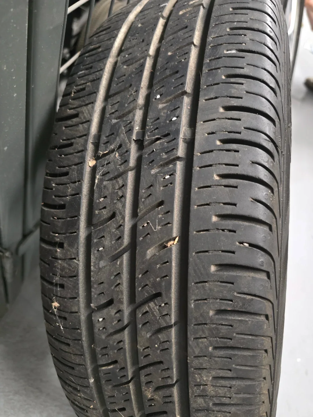 Nissan Wheel with Continental Tire 185/65R15 image indicator(6)