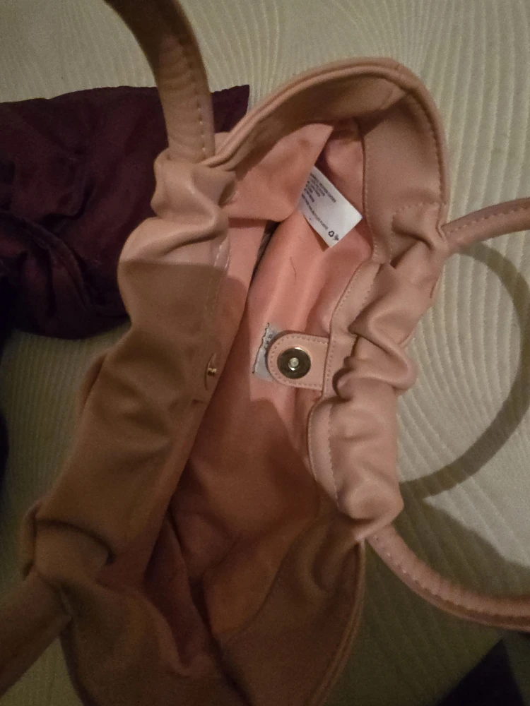 Orange   tan color a new day crocket detailed bag