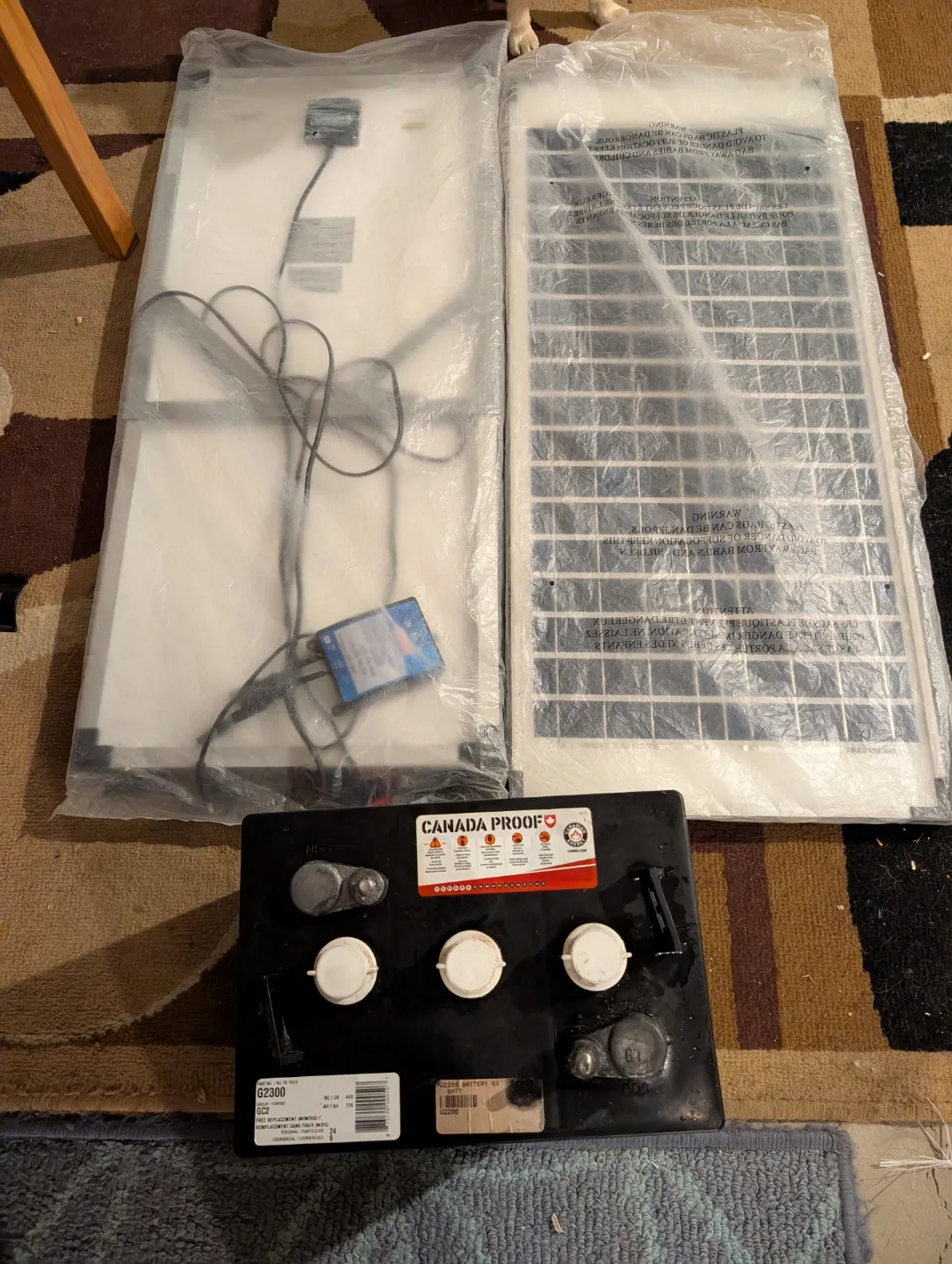 Canada proof flooded battery and  2 Coleman Soller panels